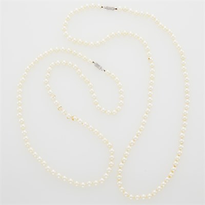 Lot 1197 - Pair of Long Cultured Pearl Necklaces with White Gold Clasps