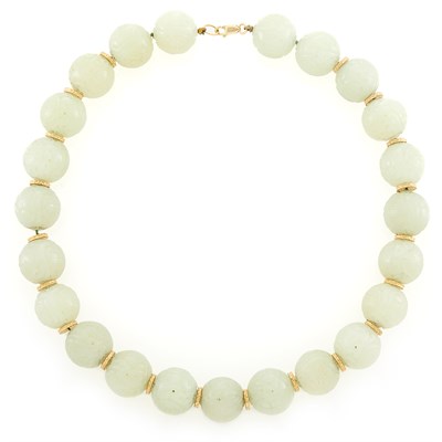 Lot 1203 - Carved Jade and Gold Bead Necklace