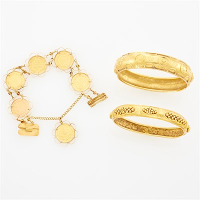 Lot 1109 - Two High Karat Gold and Gold Patterned Bangle Bracelets and Gold and Gold Coin Bracelet
