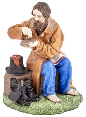 Lot 232 - Russian Porcelain Figure of a Peasant Man...