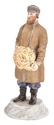 Lot 228 - Russian Porcelain Figure of a Bagel Vendor...