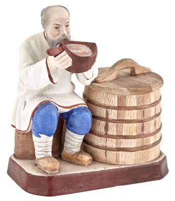 Lot 231 - Russian Porcelain Figure of a Man Drinking...