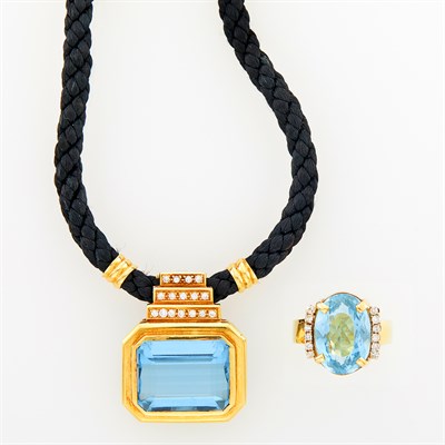 Lot 1025 - Gold, Blue Topaz and Diamond Pendant on Silk Rope and Ring