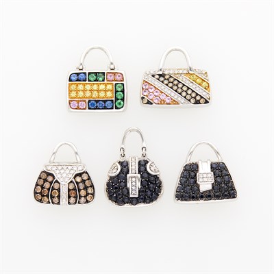 Lot 1063 - Five White Gold, Diamond, Colored Diamond, Multicolored Sapphire and Garnet Purse Charms