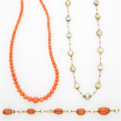 Lot 1175 - Coral Bead Necklace, Mother-of-Pearl and Gold-Filled Necklace and Gold, Carved Coral and Cultured Pearl Bracelet