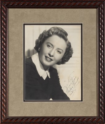 Lot 309 - Barbara Stanwyck Inscribed photograph. A large...
