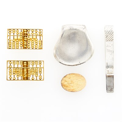 Lot 1170 - Three Tiffany & Co. Silver and Gold Money Clips and Pair of Gold Abacus Cufflinks