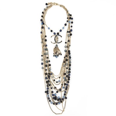 Lot 2087 - Chanel Multistrand Gilt-Metal, Rhinestone and Bead Necklace, France