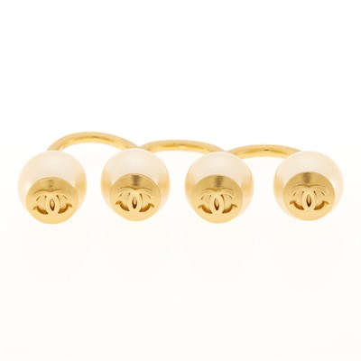 Lot 2069 - Attributed to Chanel Gilt-Metal and Imitation Pearl Three Finger Ring