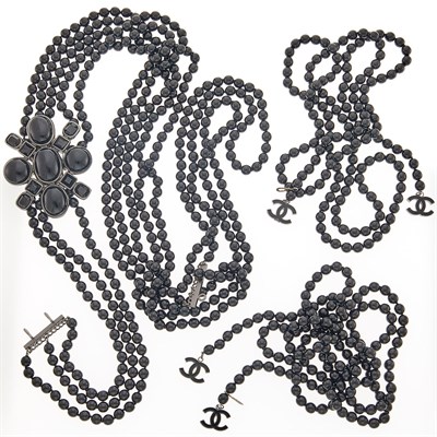 Lot 2088 - Chanel Black Glass Brooch, France, with Bead Necklaces