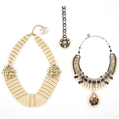 Lot 2082 - Two Chanel Gilt-Metal, Imitation Pearl, Colored Glass, Rhinestone and Lacquer Necklaces and Pendant