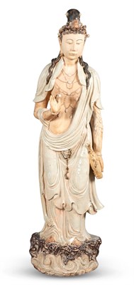 Lot 1162 - A Chinese Glazed and Painted Pottery Figure of Guanyin  Republic PeriodDepicting the standing goddess in loose robes adorned with jewery.Height 50 inches.