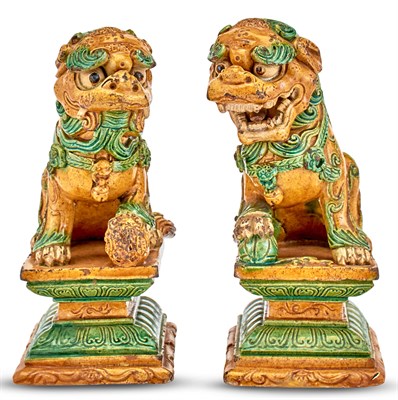 Lot 1150 - A Pair of Chinese Glazed Tilework Fu Lions...