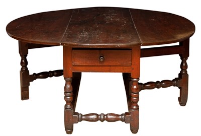 Lot 254 - Continental Baroque Walnut Drop-Leaf Dining...