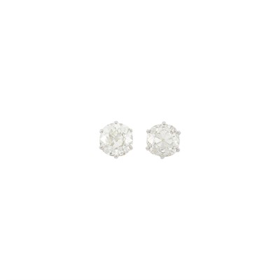 Lot 163 - Pair of Two-Color Gold and Diamond Stud Earrings
