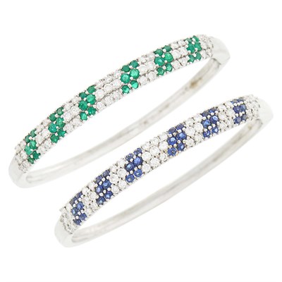 Lot 65 - Pair of White Gold, Diamond, Emerald and Sapphire Bangle Bracelets