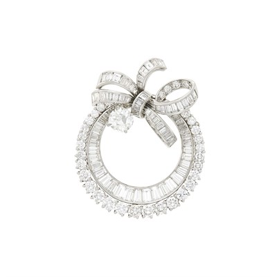 Lot 78 - Cartier Platinum and Diamond Circle Bow Brooch
