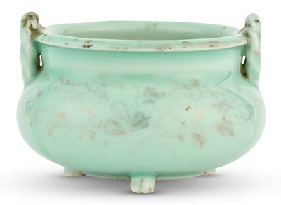 Lot 1129 - A Chinese Celadon Glazed Tripod Censer Late...