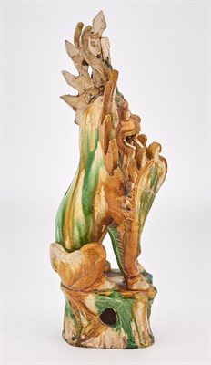 Lot 103 - A Chinese Sancai Glazed Pottery Earth Spirit...