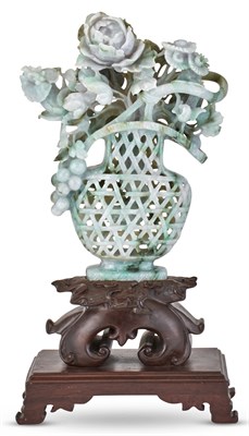 Lot 1079 - A Chinese Carved Jadeite Flower Basket 20th...