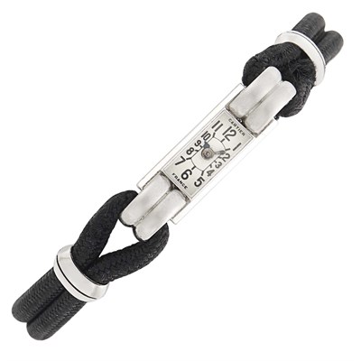 Lot 96 - Cartier Platinum, Gold and Black Enamel 'Baguette' Wristwatch, France