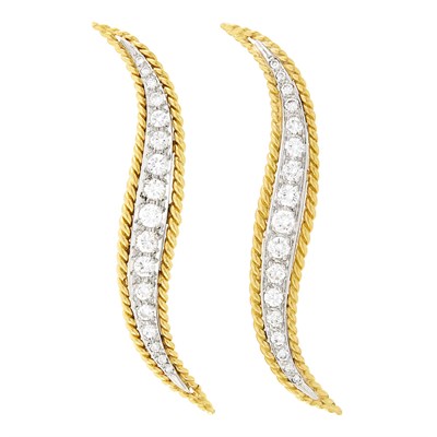 Lot 12 - Van Cleef & Arpels Pair of Two-Color Gold and Diamond 'La Flamme' Brooches
