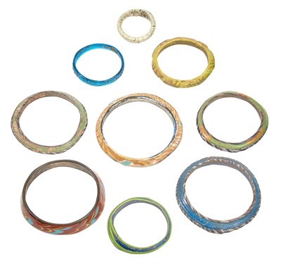 Lot 324 - Group of Nine Ancient Roman Glass Bangle...
