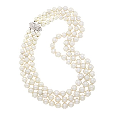 Lot 146 - Triple Strand South Sea Cultured and Simulated Pearl Necklace with White Gold and Diamond Clasp