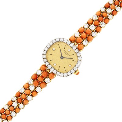 Lot 127 - Patek Philippe Gold, Coral and Diamond Wristwatch, Ref. 4002/1