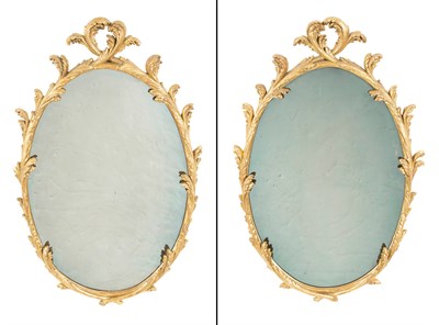 Lot 251 - Pair of George III Giltwood Oval Mirrors...