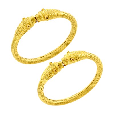 Lot 141 - Pair of Gold Chimera Head Bangle Bracelets