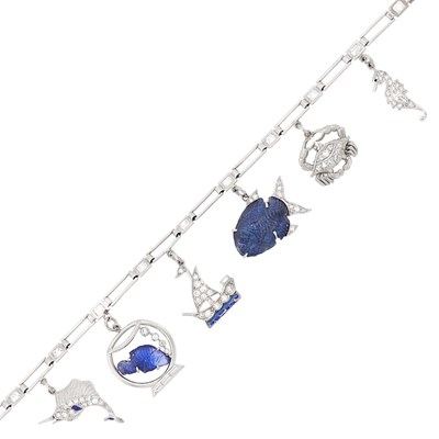 Lot 133 - Platinum, Diamond, Carved Sapphire and Enamel Charm Bracelet