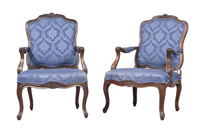 Lot 130 - Similar Pair of Louis XV Walnut Fauteuils a la...