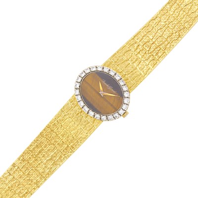 Lot 146 - Bueche Girod Gold, Tiger's Eye and Diamond Wristwatch