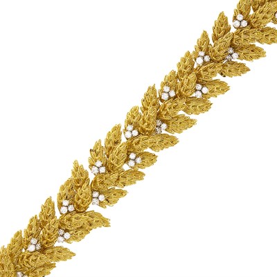 Lot 216 - Cartier Gold, Platinum and Diamond Bracelet, France