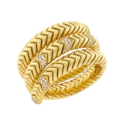 Lot 19 - Triple Coil Gold and Diamond Bracelet