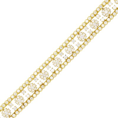 Lot 227 - Van Cleef & Arpels Gold and Diamond 'Snowflake' Bracelet