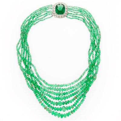 Lot 1194 - Seven Strand Emerald Bead Necklace with White Gold and Green Quartz Clasp