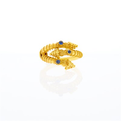 Lot 1056 - High Karat Gold and Cabochon Sapphire Ring