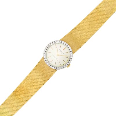 Lot 24 - Patek Philippe, Retailed by Tiffany & Co. Gold and Diamond Wristwatch, Ref. 3551/1