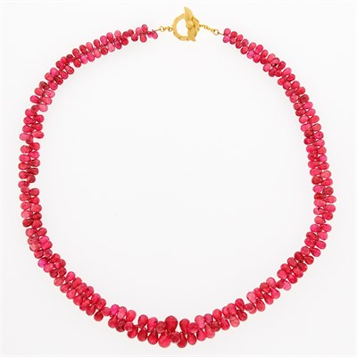 Lot 1053 - Ruby Bead Necklace with Gold Toggle Clasp