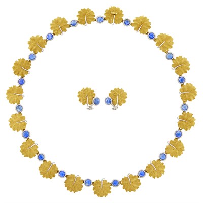 Lot 194 - Buccellati Two-Color Gold and Cabochon Sapphire Leaf Necklace and Pair of Earclips