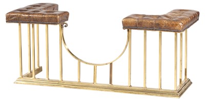 Lot 359 - Leather Upholstered Brass Club Fender Early...