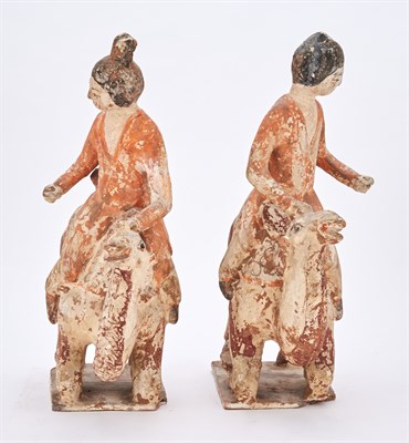 Lot 105 - A Pair of Chinese Painted Pottery Models of...