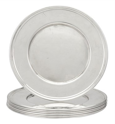 Lot 247 - Set of Seven Cartier Sterling Silver Chargers...