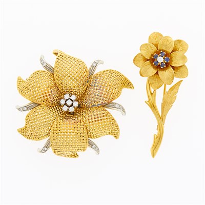 Lot 1072 - Two-Color Gold and Diamond Flower Brooch and Tiffany & Co. Gold, Sapphire and Diamond Flower Brooch