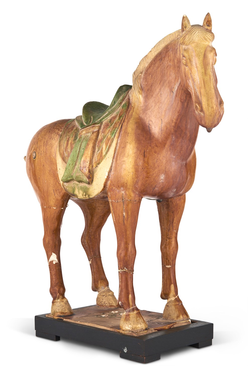Lot 104 - A Chinese Sancai Glazed Pottery Figure of a...