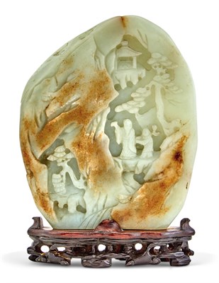 Lot 56 - A Chinese Celadon and Russet Jade Boulder Qing...