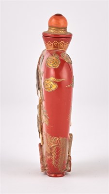 Lot 16 - An Embellished Red Lacquer Snuff Bottle Tsuda...