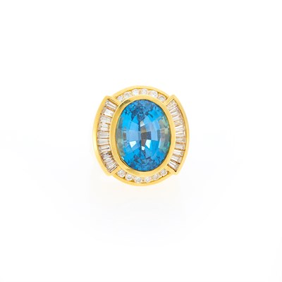 Lot 1237 - Gold, Blue Topaz and Diamond Ring